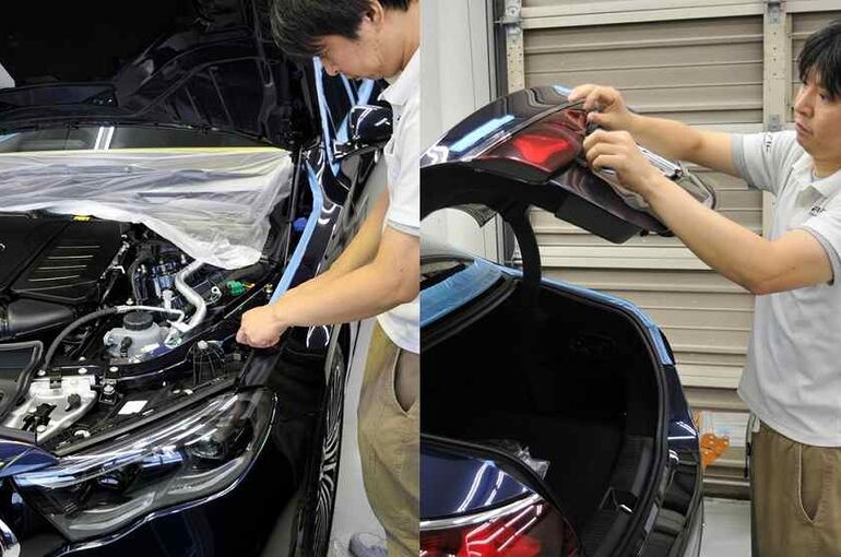 メルセデスベンツE350eの画像。磨き施工前にガラス面の端やメッキパーツなど、磨かない箇所をマスキングテープなどで養生している写真。
